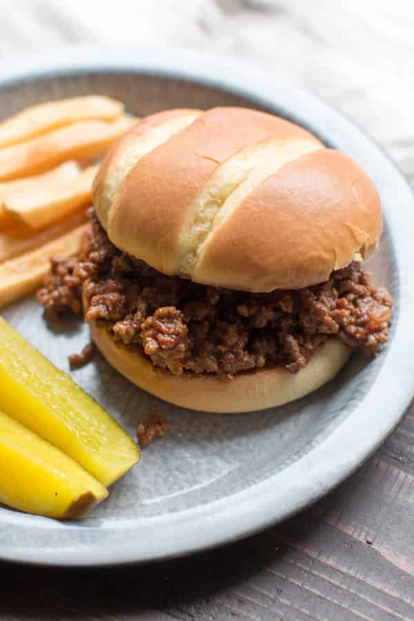 close up of barbecue beef sandwich on a pie tine.