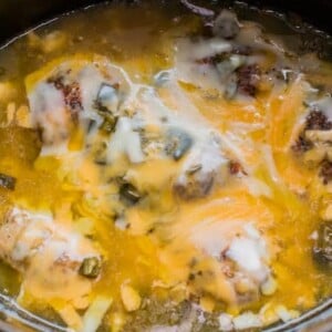close up of cheesy green chile chicekn thighs