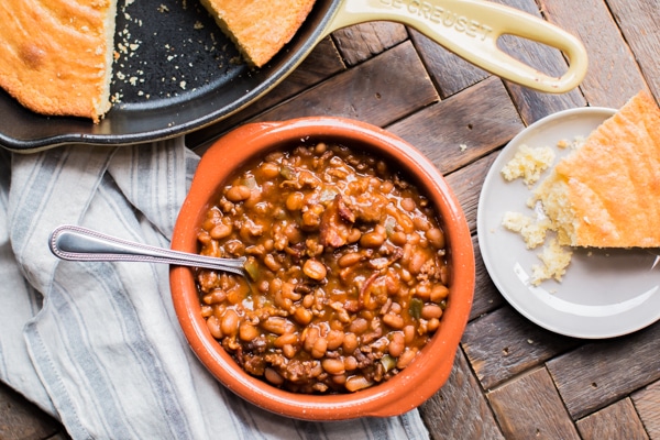 bowl of land your man baked beans with cornbread.