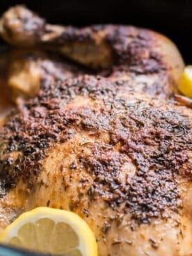 whole chicken in a slow cooker with lemons