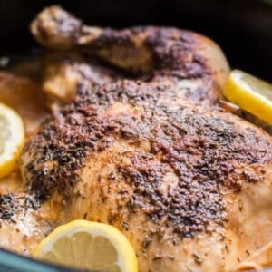 whole chicken in a slow cooker with lemons