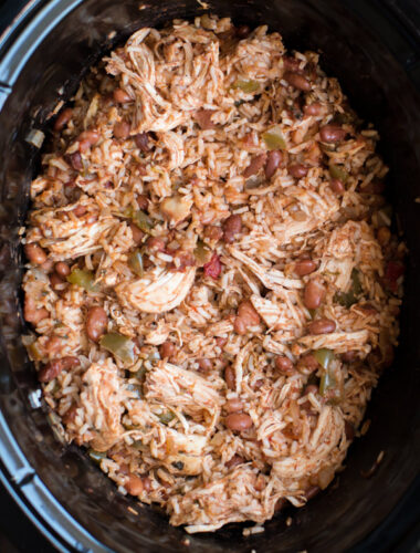 close up of chicken burrito filling in a slow cooker.