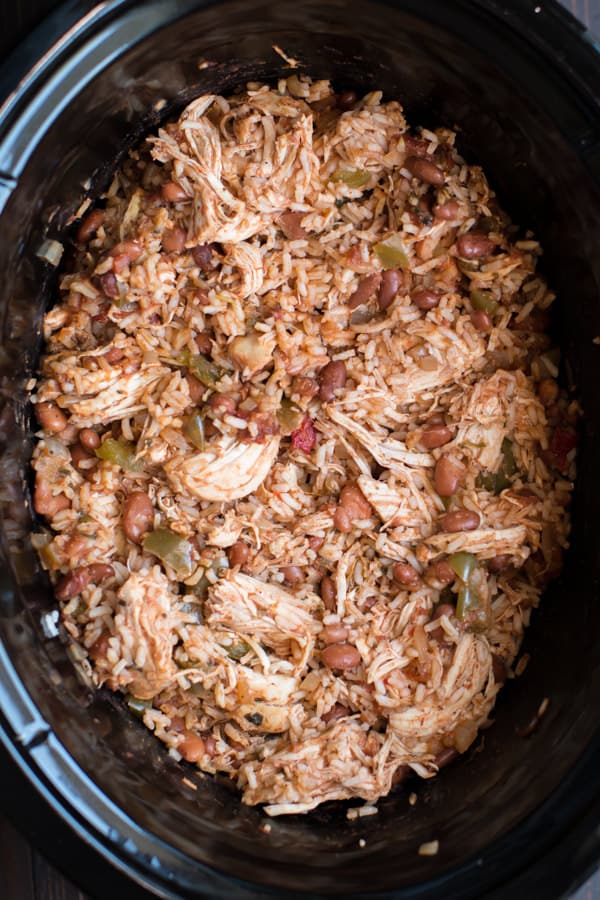 close up of chicken burrito filling in a slow cooker.