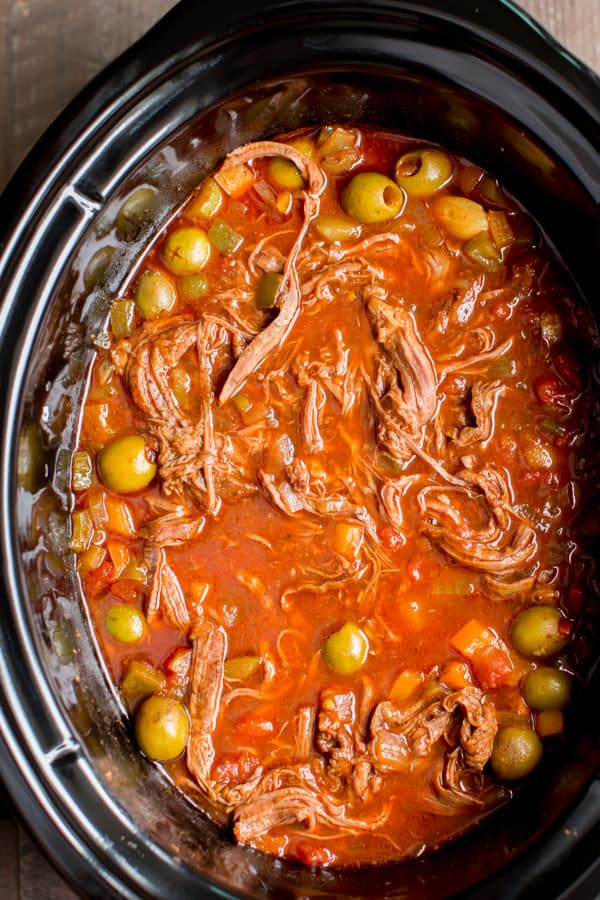 slow cooker filled with ropa vieja