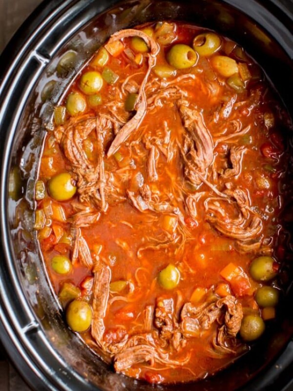 ropa vieja done cooking in the slow cooker.