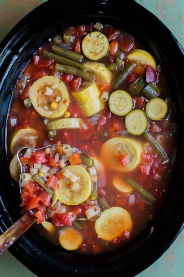 close up of summer minestrone soup in a slow cooker