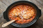 Spaghetti and kielbasa and sauce in a slow cooker