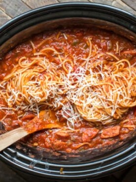 Spaghetti and kielbasa and sauce in a slow cooker