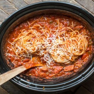 Spaghetti and kielbasa and sauce in a slow cooker