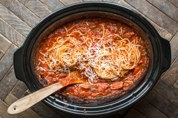 Spaghetti and kielbasa and sauce in a slow cooker