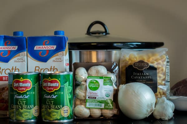 chicken broth, mushrooms, cavatappi pasta, onion, garlic, onion, beef and green beans.