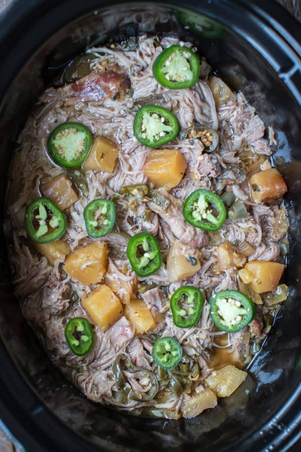 shredded pork with jalapenos and pineapple on top.