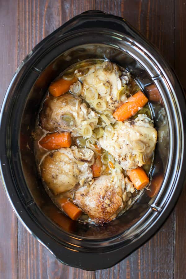 carrots, leeks and chicken thighs cooked in a slow cooker.