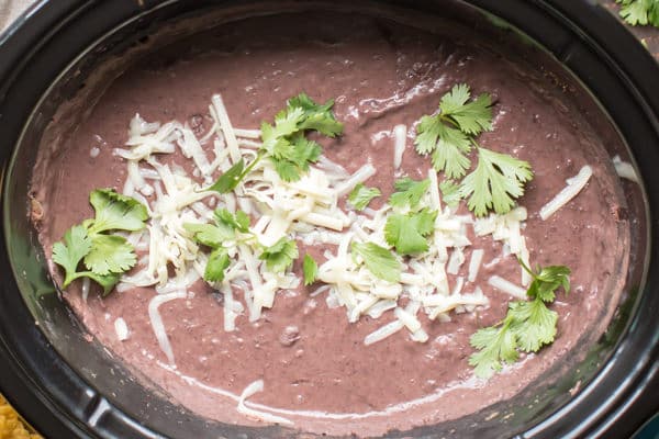 https://www.themagicalslowcooker.com/wp-content/uploads/2017/09/refried-black-beans-1-of-1-3.jpg