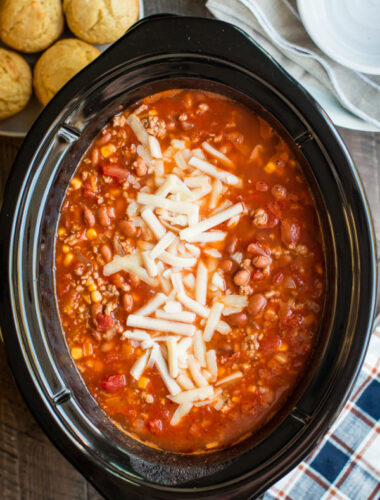 chipotle turkey chili with shredded white cheese on top.