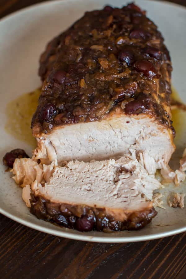This slow cooker pork loin roast is flavored with a combination of pineapple and cranberry sauce. Slow Cooker Cranberry Pork Loin : Slow Cooker Cranberry Pork Loin - The Magical Slow Cooker