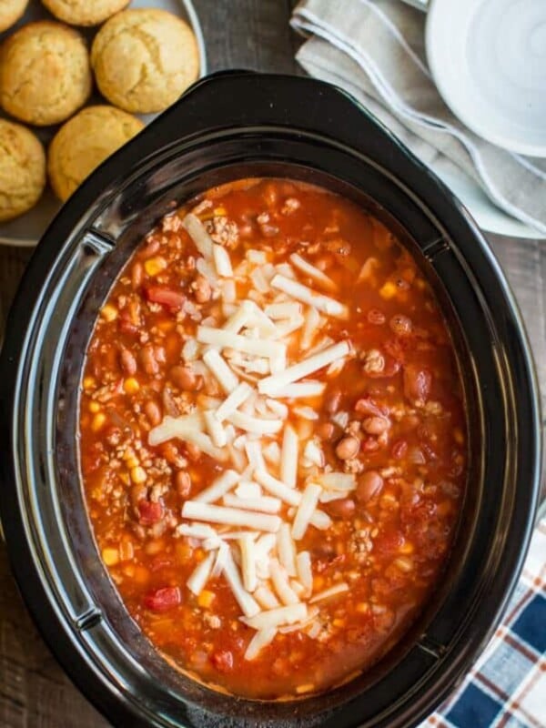 turkey chili done cooking in slow cooker with cheese.
