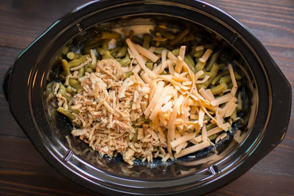 green beans, cheese and french fried onions in a slow cooker