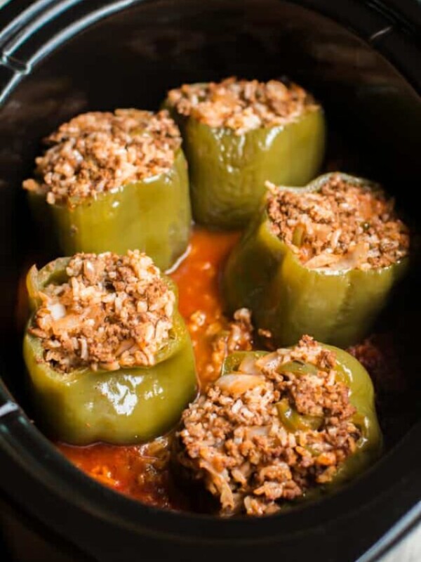 5 stuffed peppers in a slow cooker.