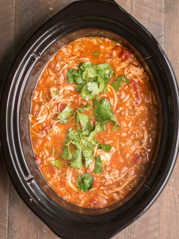 Mexican chicken soup with cilantro on top.