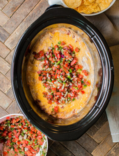 slow cooker with ranch bean dip in it.