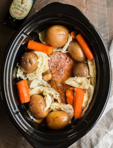 corned beef with garlic, guinness beer, carrots and cabbage