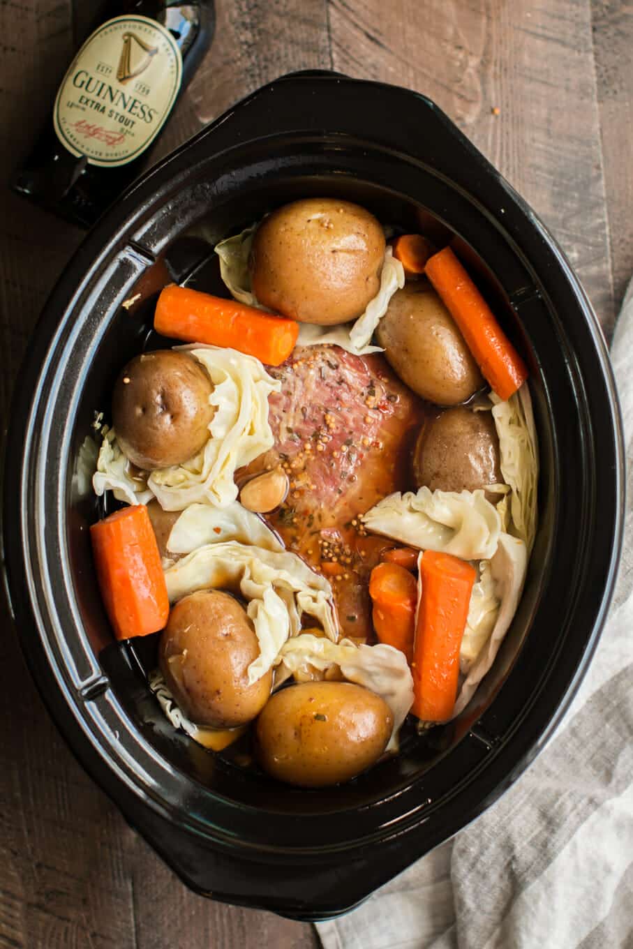 corned beef with garlic, guinness beer, carrots and cabbage