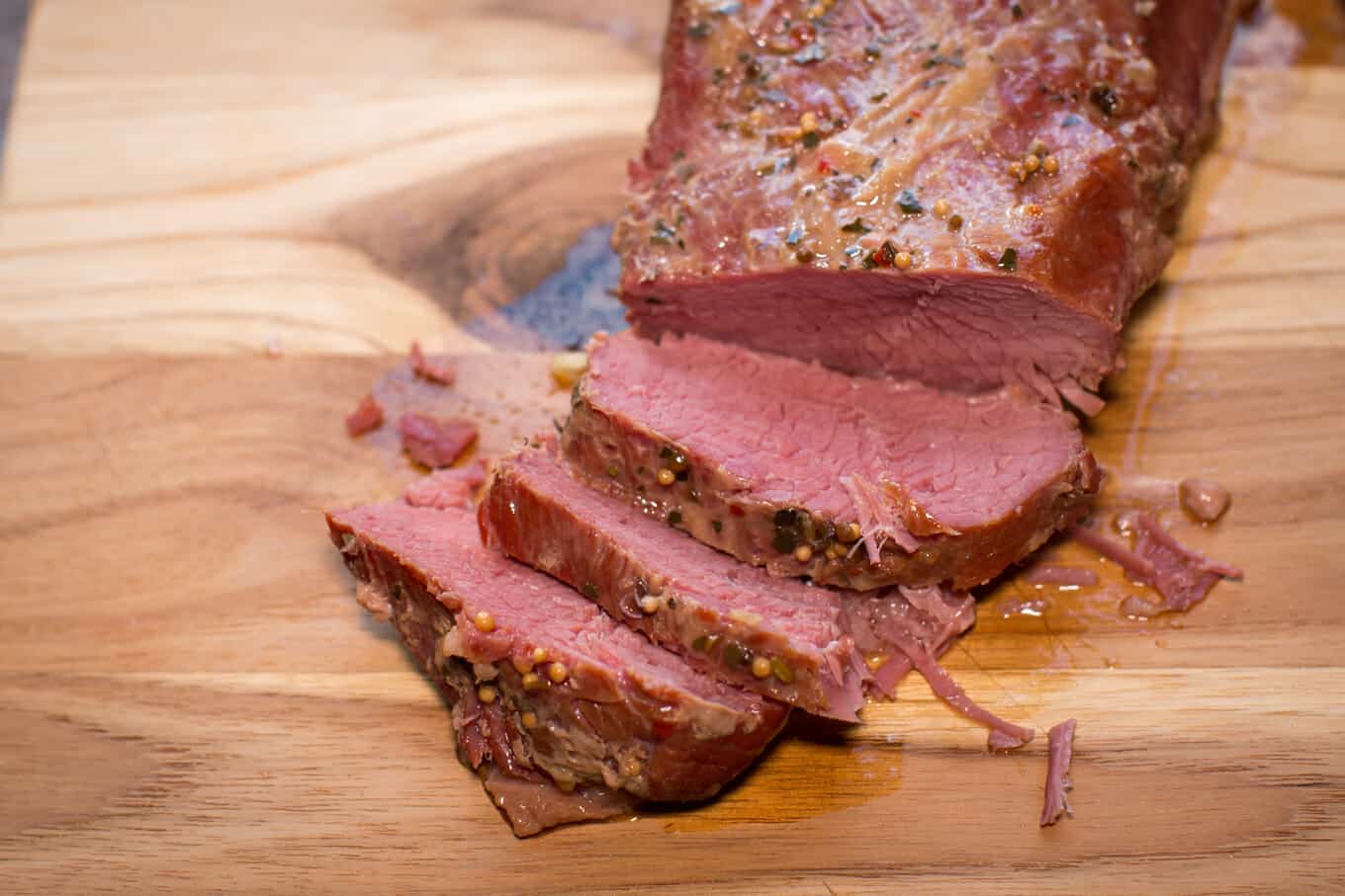 sliced corned beef on a cutting board