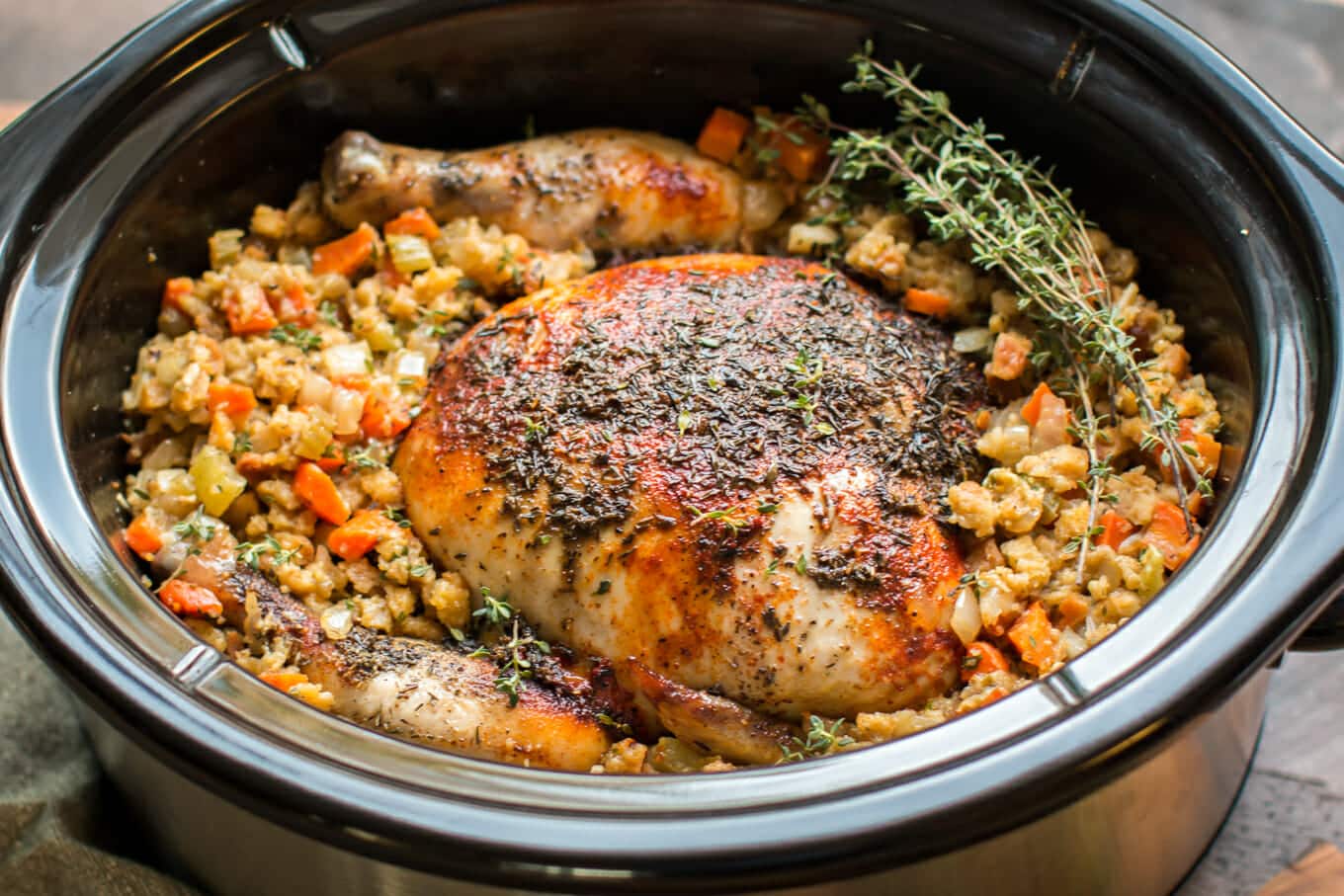 close up of whole chicken with stuffing.