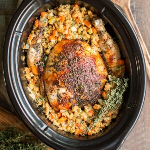 whole chicken in stuffing with thyme in the slow cooker