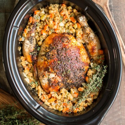 whole chicken in stuffing with thyme in the slow cooker