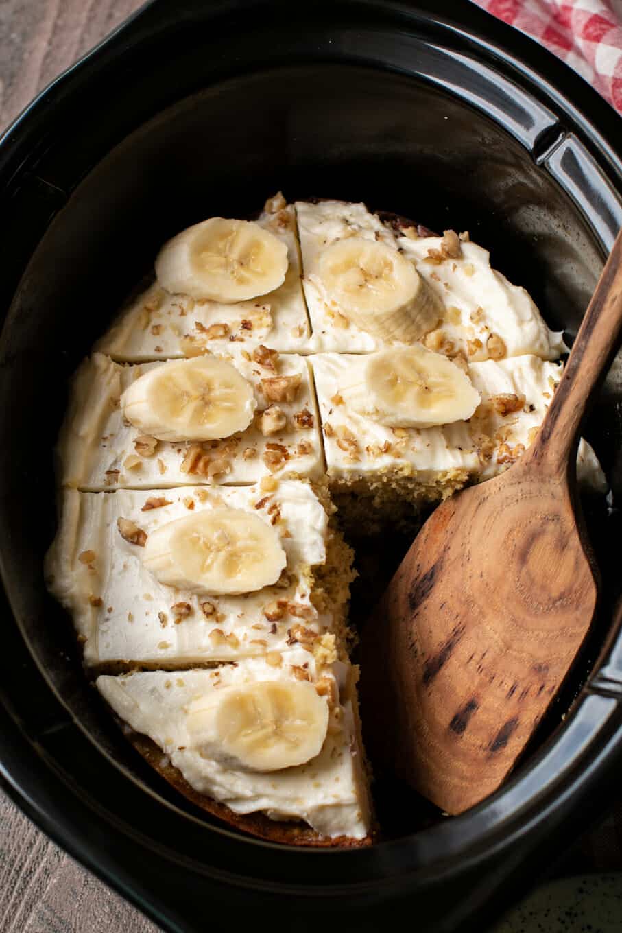 close up of banana nut cake with 2 slices missing.