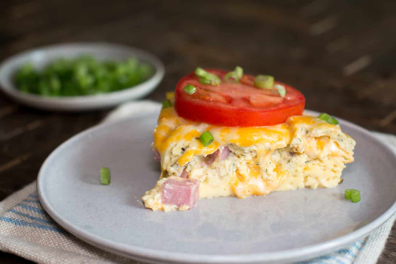 slice of farmer\'s breakfast egg casserole on plate