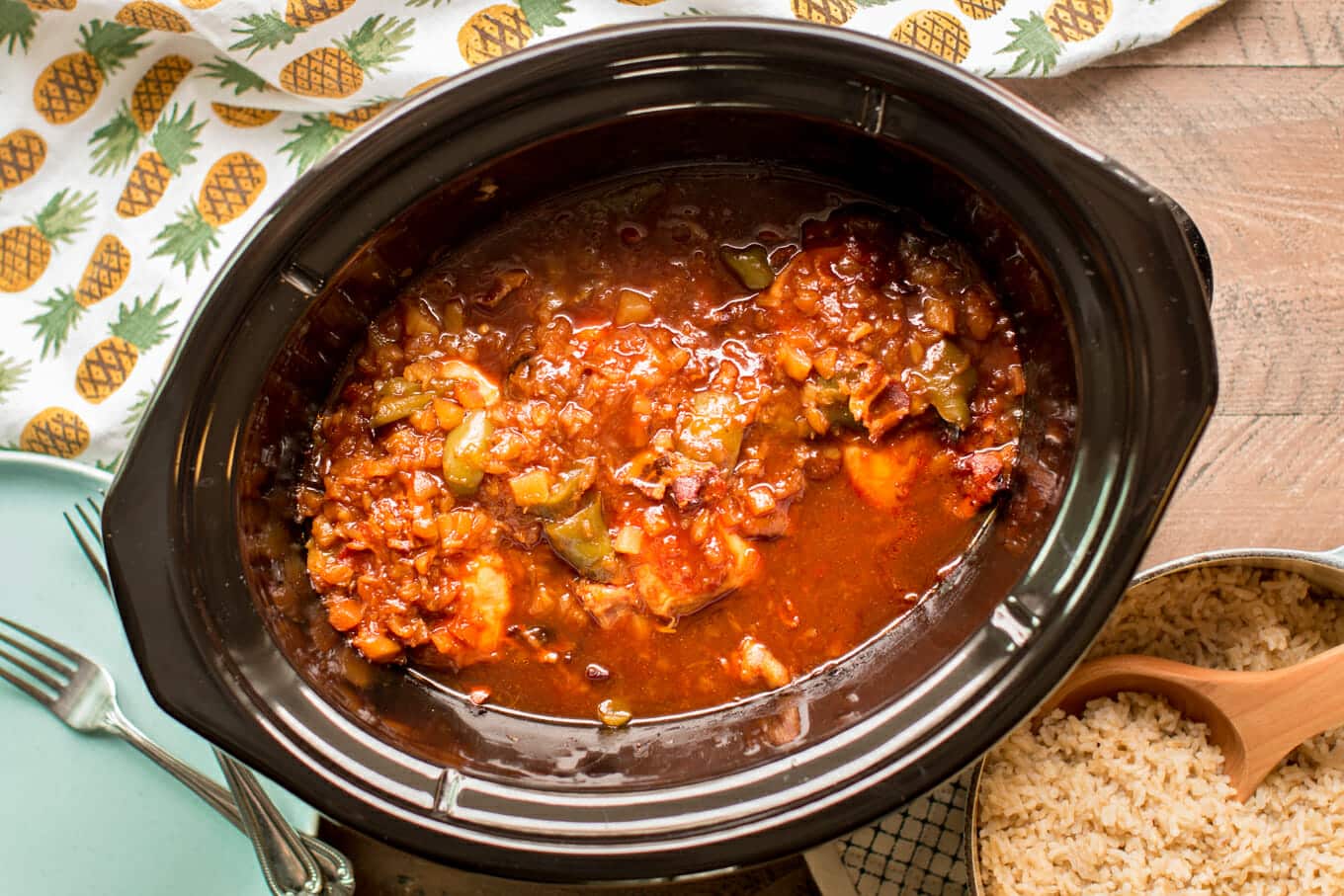 Hawaiian chicken in slow cooker with brown rice on the side.