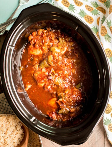 chicken breasts in barbecue sauce in a slow cooker.