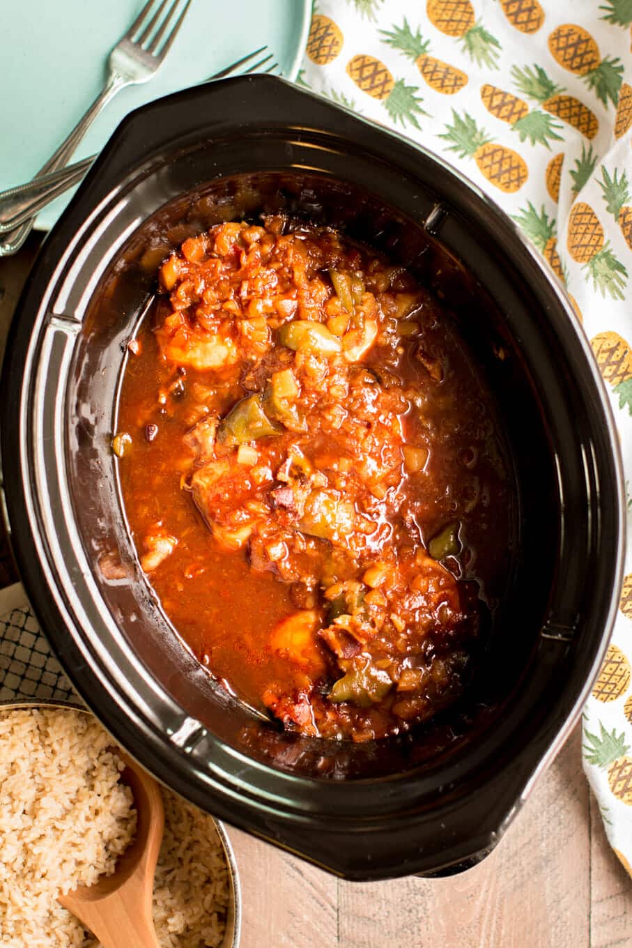 chicken breasts in barbecue sauce in a slow cooker.