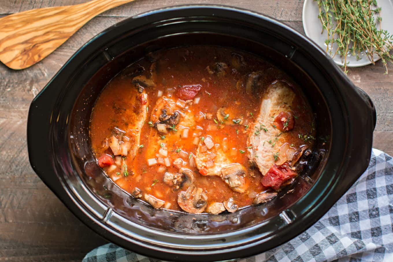 finished cooking pork chop cacciatore in slow cooker.