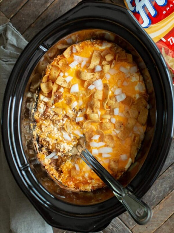 Frito chili cheese casserole in a slow cooker.
