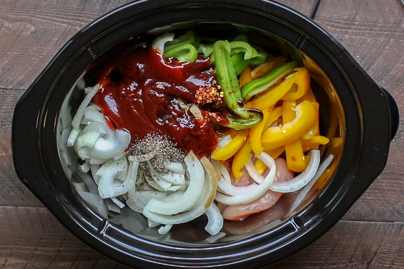 chicken tenders, green and yellow bell peppers, onion, barbecue sauce, and seasonings.