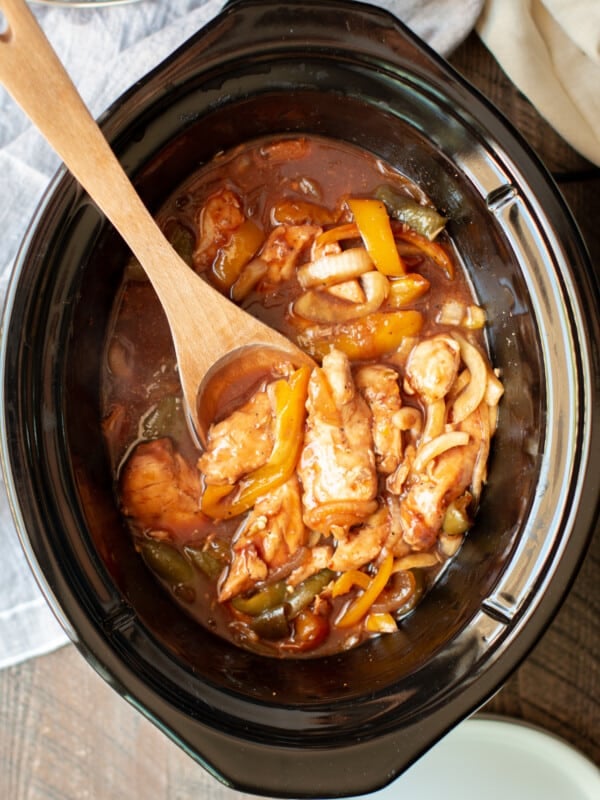 wooden spoon in barbecue chicken