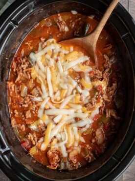no bean chili in slow cooker with cheese on top in slow cooker