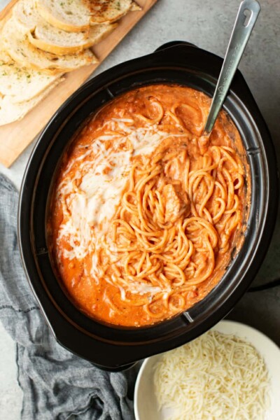 Slow Cooker Creamy Chicken Spaghetti - The Magical Slow Cooker