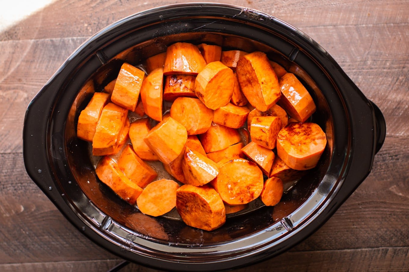 raw yams ready to cook in the slow cooker.