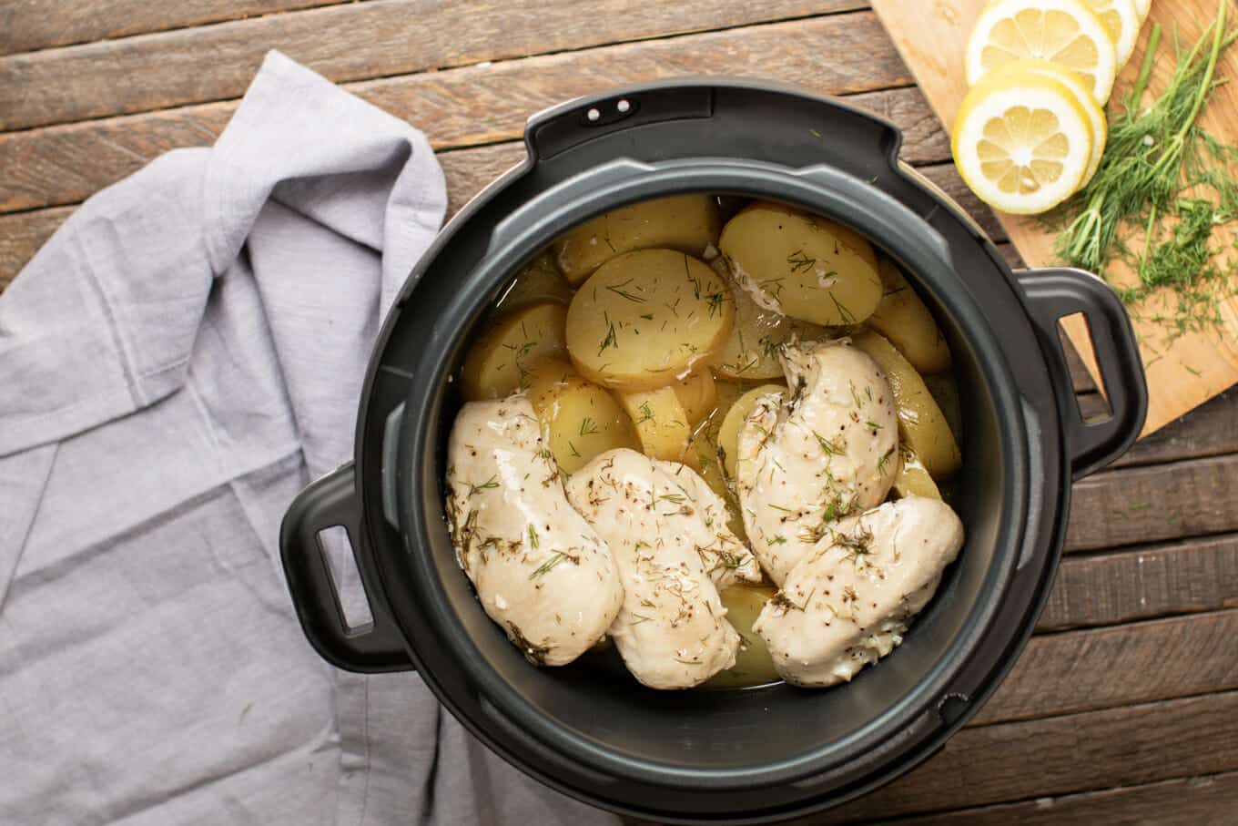 lemon chicken, gold potatoes and dill in a pressure cooker.