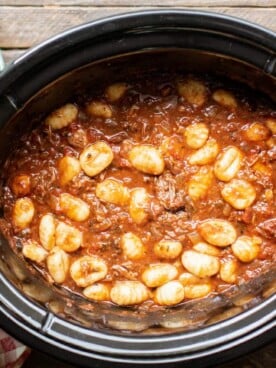 shredded short ribs in sauce with gnocchi stirred in