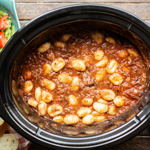 shredded short ribs in sauce with gnocchi stirred in