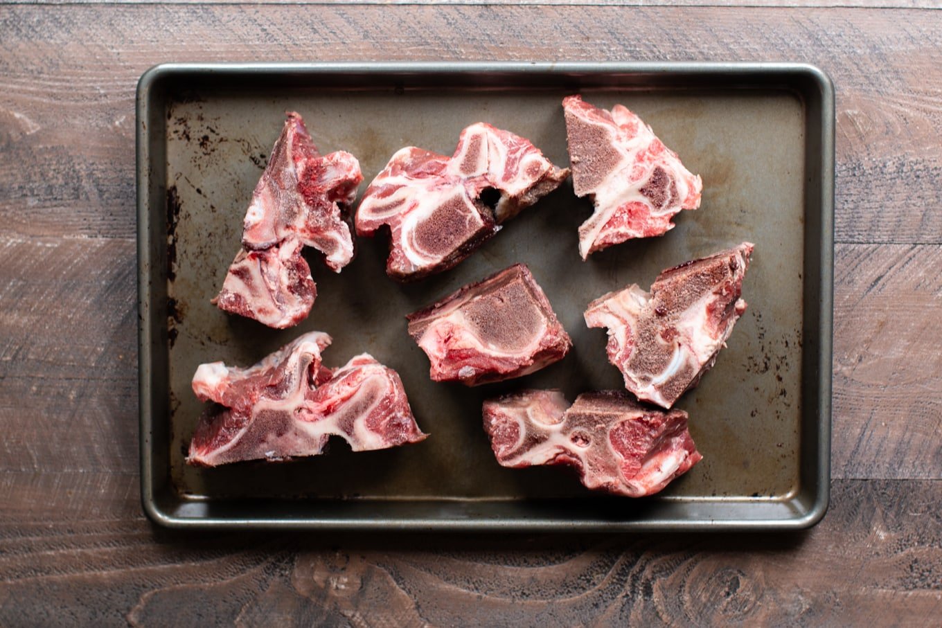 beef bones on sheet pan, uncooked.