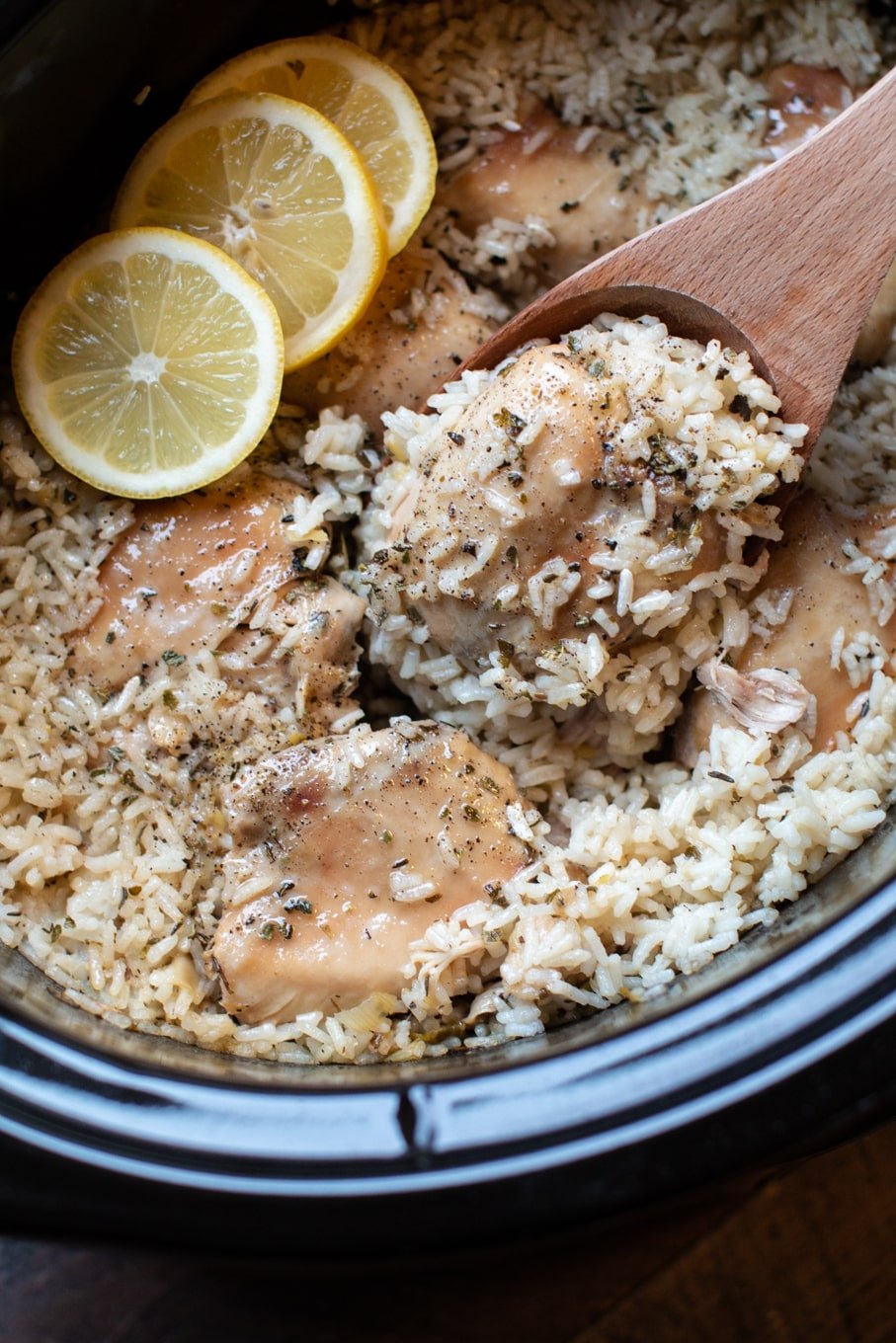 close up of lemon chicken and rice in slow cooker.