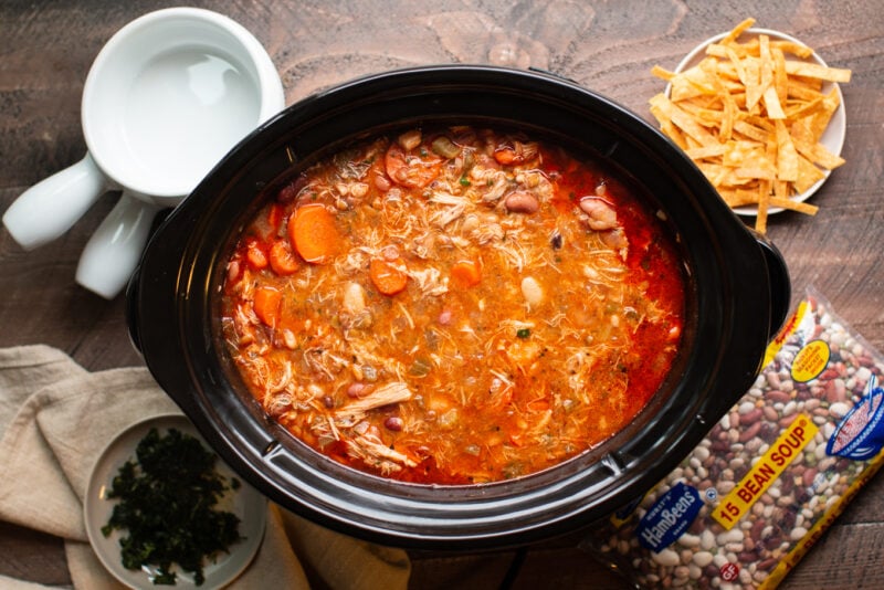 buffalo chicken soup with tortilla strips on the side.