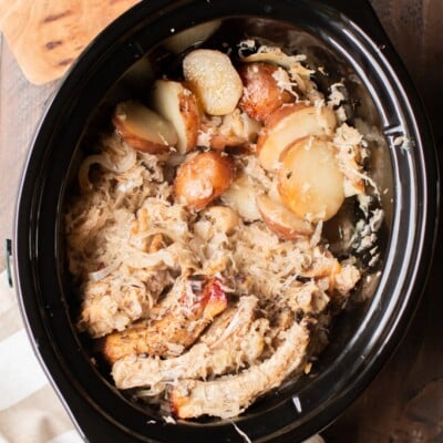 ribs, sliced potatoes and sauerkraut in a slow cooker